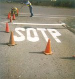 sotp-huge-white-misspelled-freshly-painted-stop-sign-on-road-anon.jpg